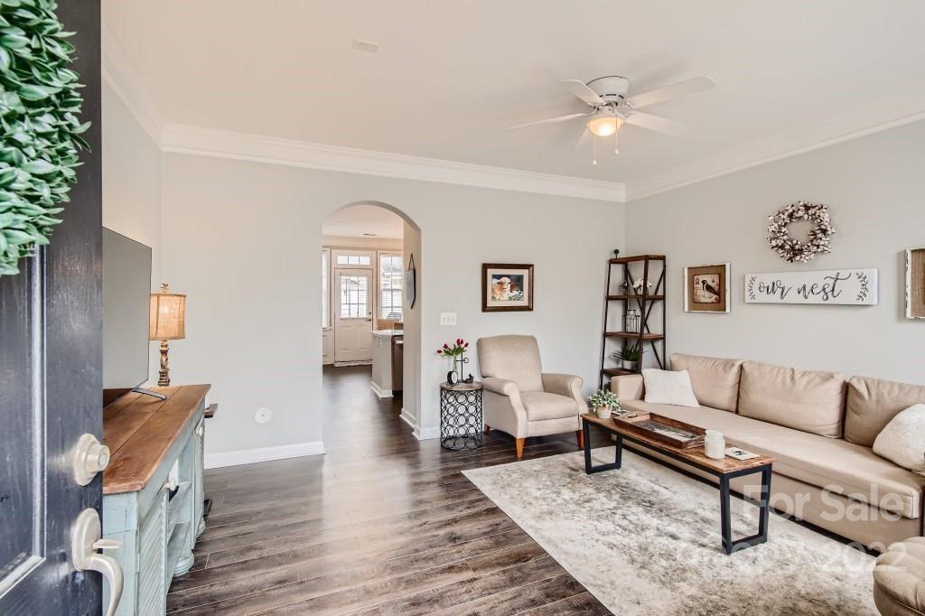 10461 Rocky Ford Club Road Charlotte, NC 28078 - Photo 3 of 27 a living room with furniture and wooden floor
