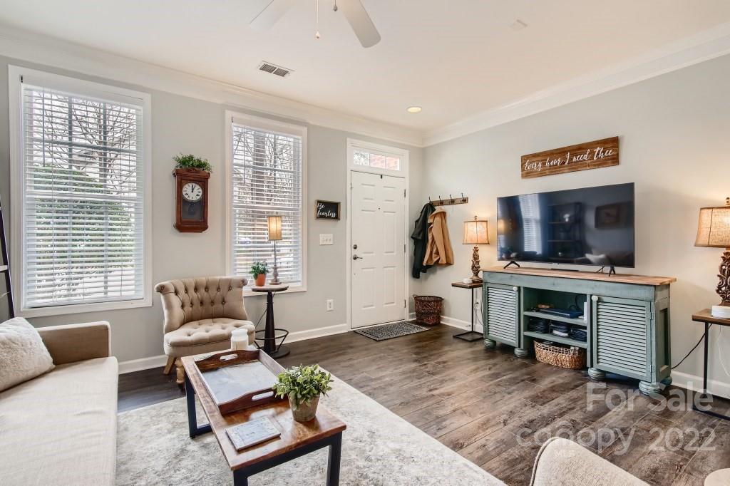 10461 Rocky Ford Club Road Charlotte, NC 28078 - Photo 5 of 27 a living room with furniture and a flat screen tv