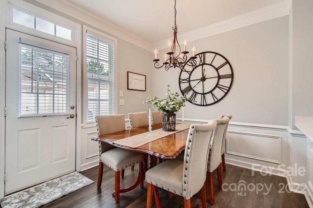10461 Rocky Ford Club Road Charlotte, NC 28078 - Photo 7 of 27 a view of a dining room with furniture window and wooden floor