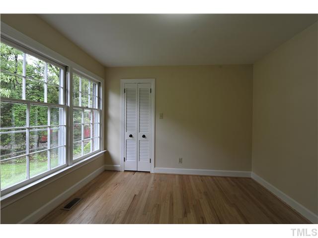 5010 Picardy Place Raleigh, NC 27612 - Photo 10 of 25 a view of wooden floor and windows in a room
