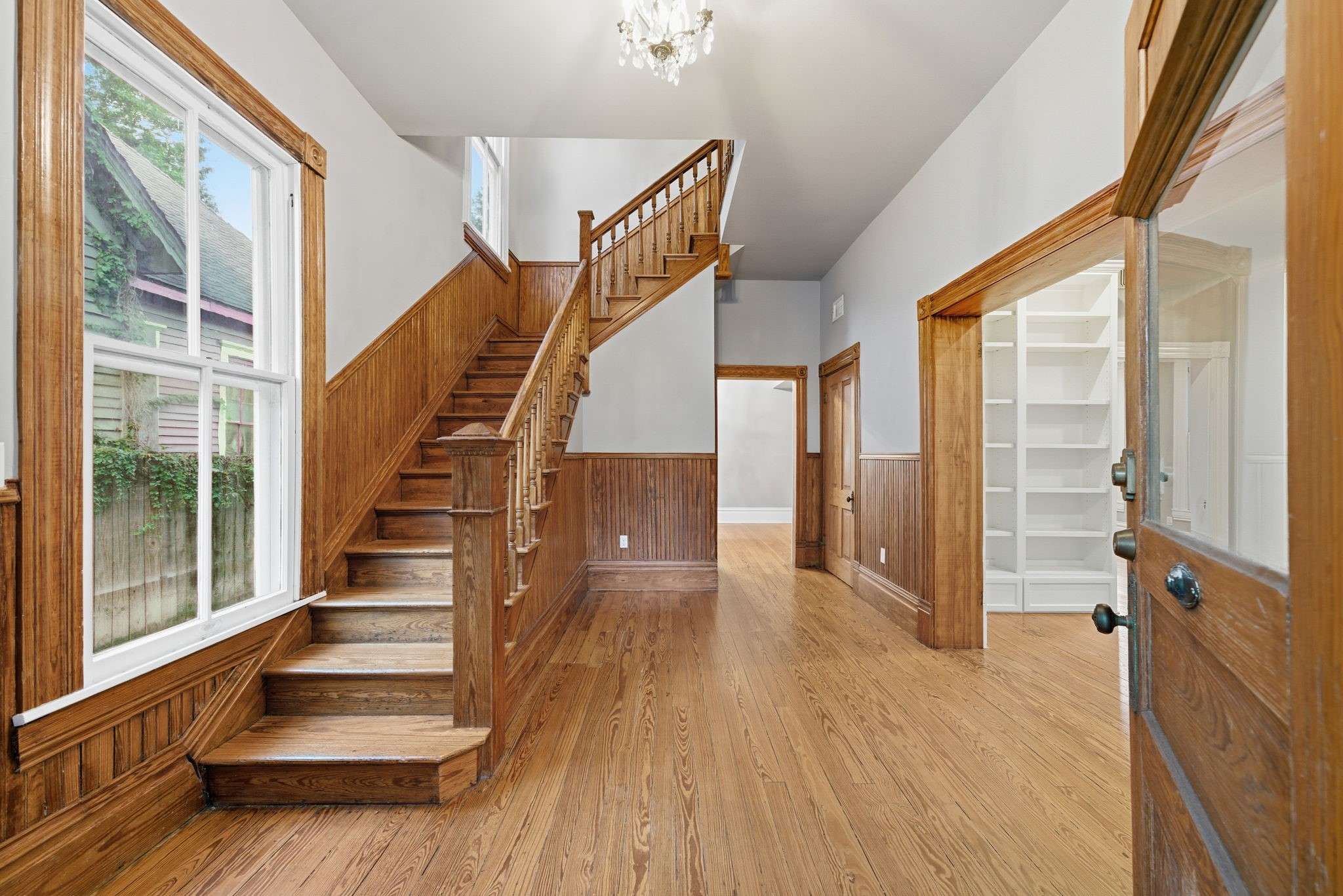 1818 Decatur Street Houston, TX 77007 - Photo 11 of 48 a view of an entryway with wooden floor and staircase