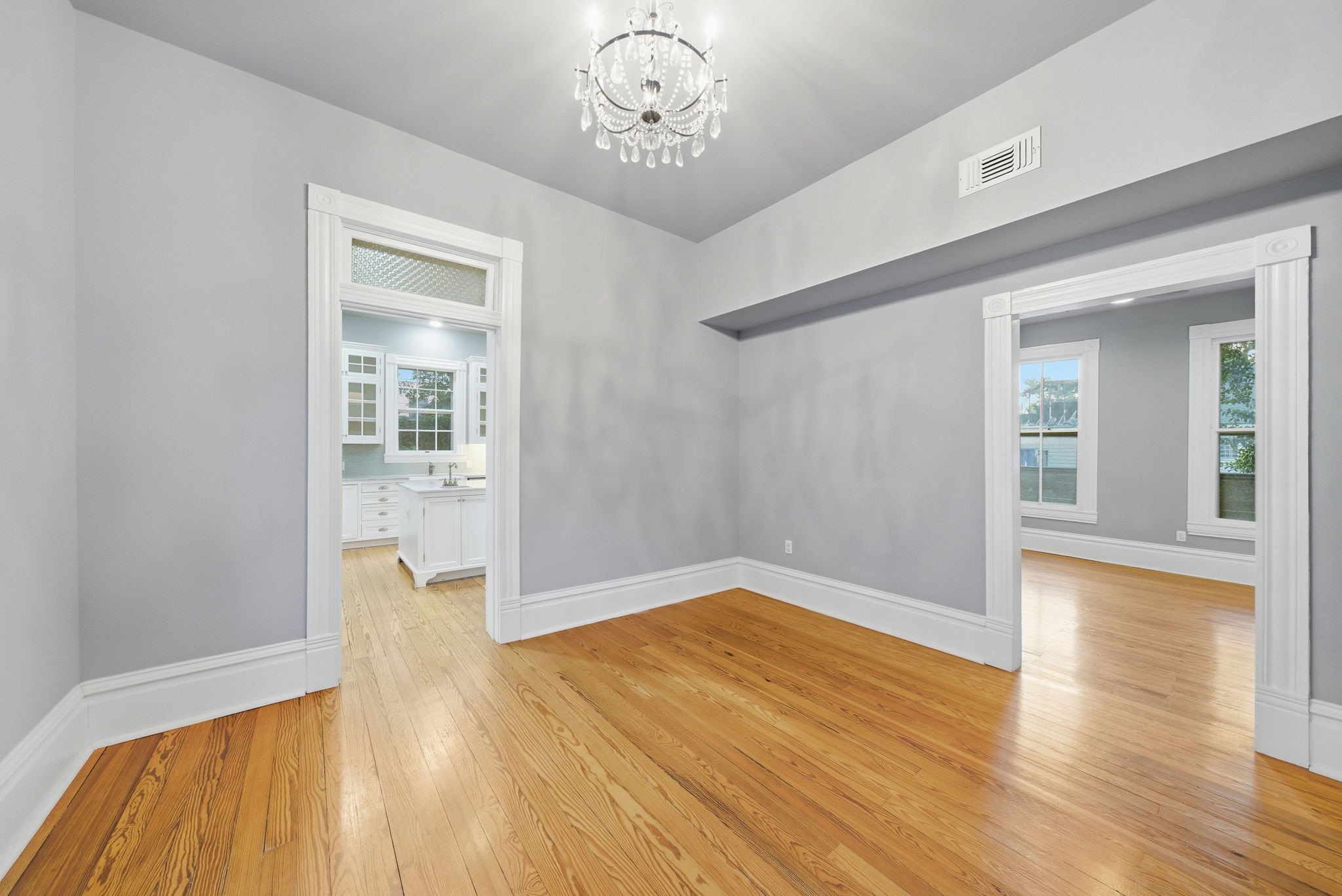 1818 Decatur Street Houston, TX 77007 - Photo 19 of 48 wooden floor in an empty room with a window