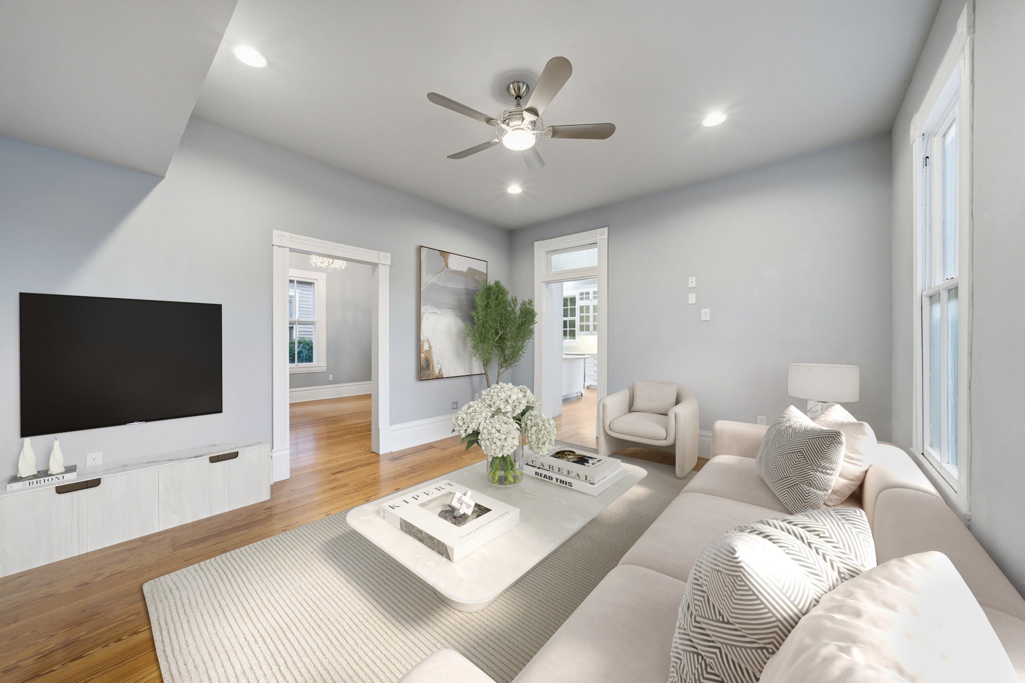 1818 Decatur Street Houston, TX 77007 - Photo 20 of 48 a living room with furniture a flat screen tv and a large window