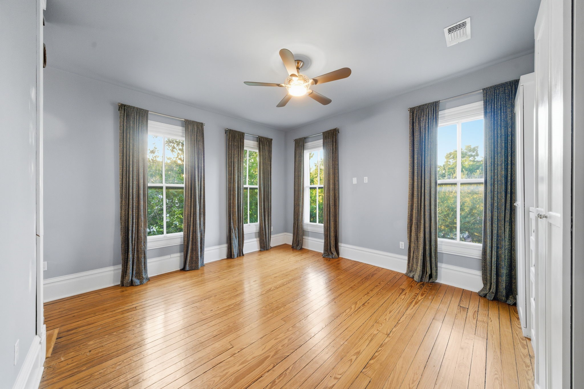 1818 Decatur Street Houston, TX 77007 - Photo 24 of 48 a view of a livingroom with a ceiling fan and window
