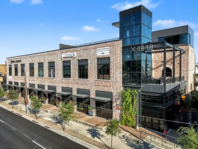 a view of a garden with an outdoor space