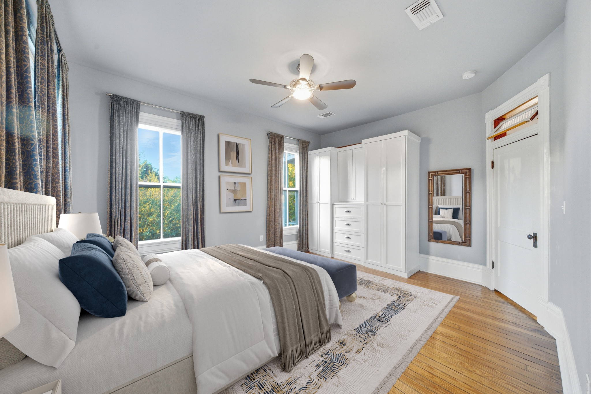 1818 Decatur Street Houston, TX 77007 - Photo 7 of 48 a bedroom with a large bed and a chandelier