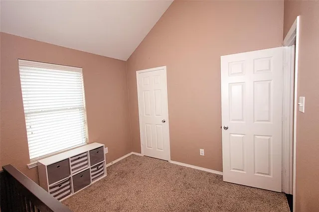 a bed room with a bed and a couch