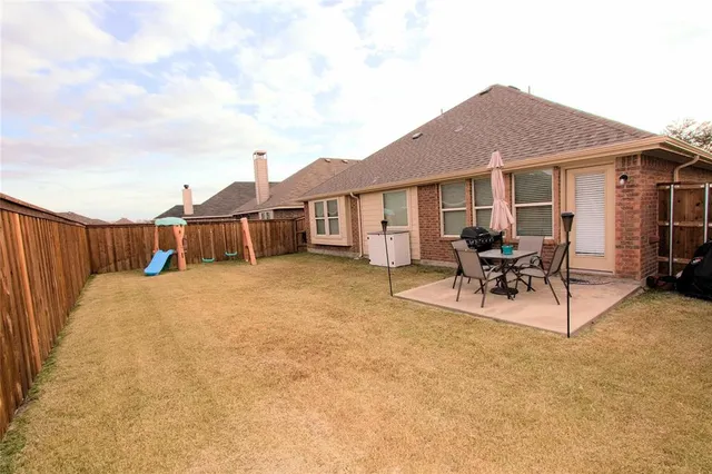 a street view with large trees