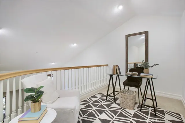 a bathroom with a granite countertop tub sink double and mirror