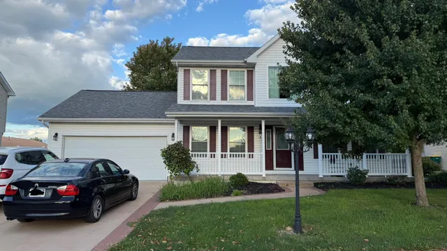 a house view with a garden space