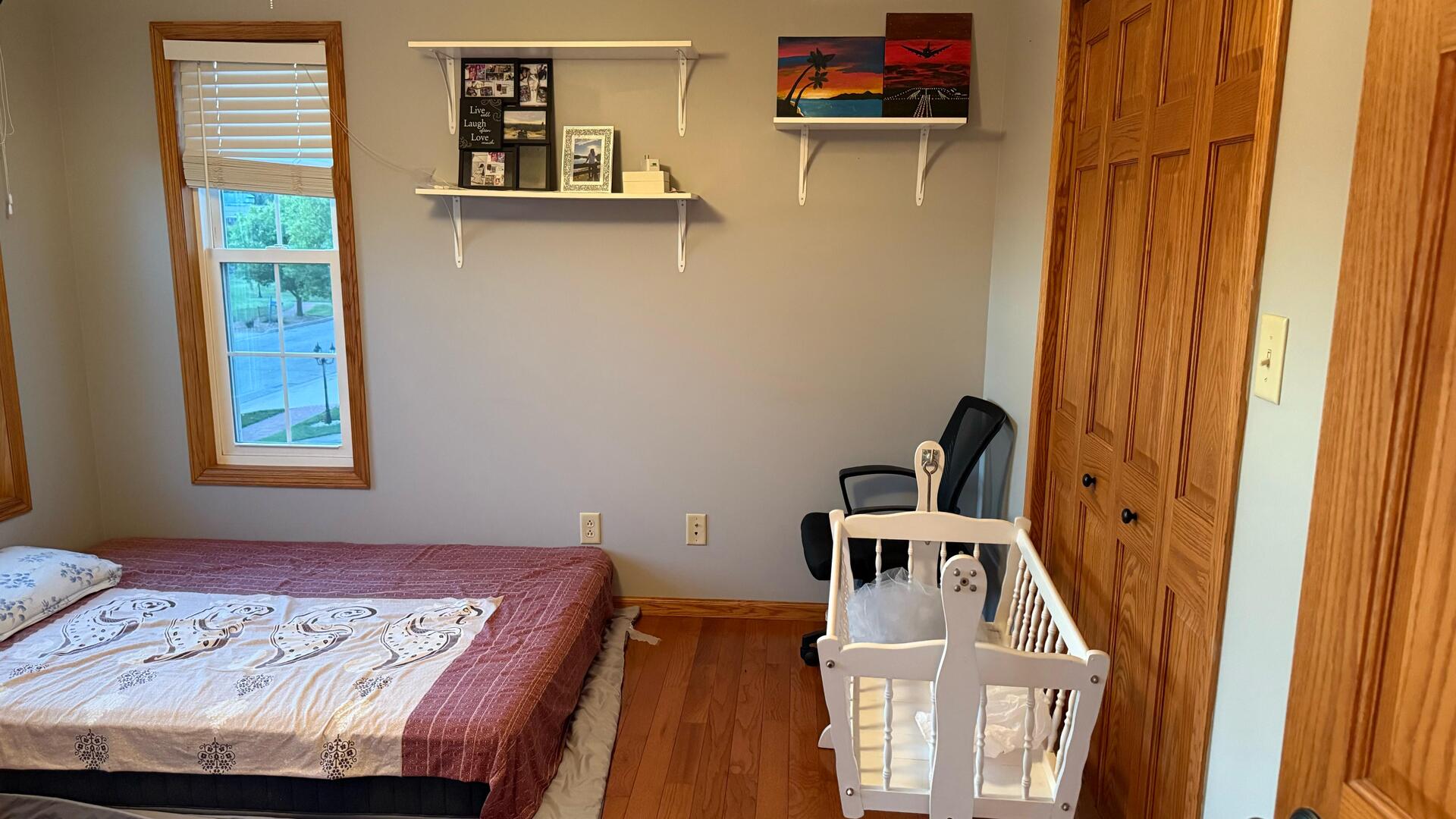 4 Memory Lane Streator, IL 61364 - Photo 18 of 28 a view of a bedroom with bed and wooden floor
