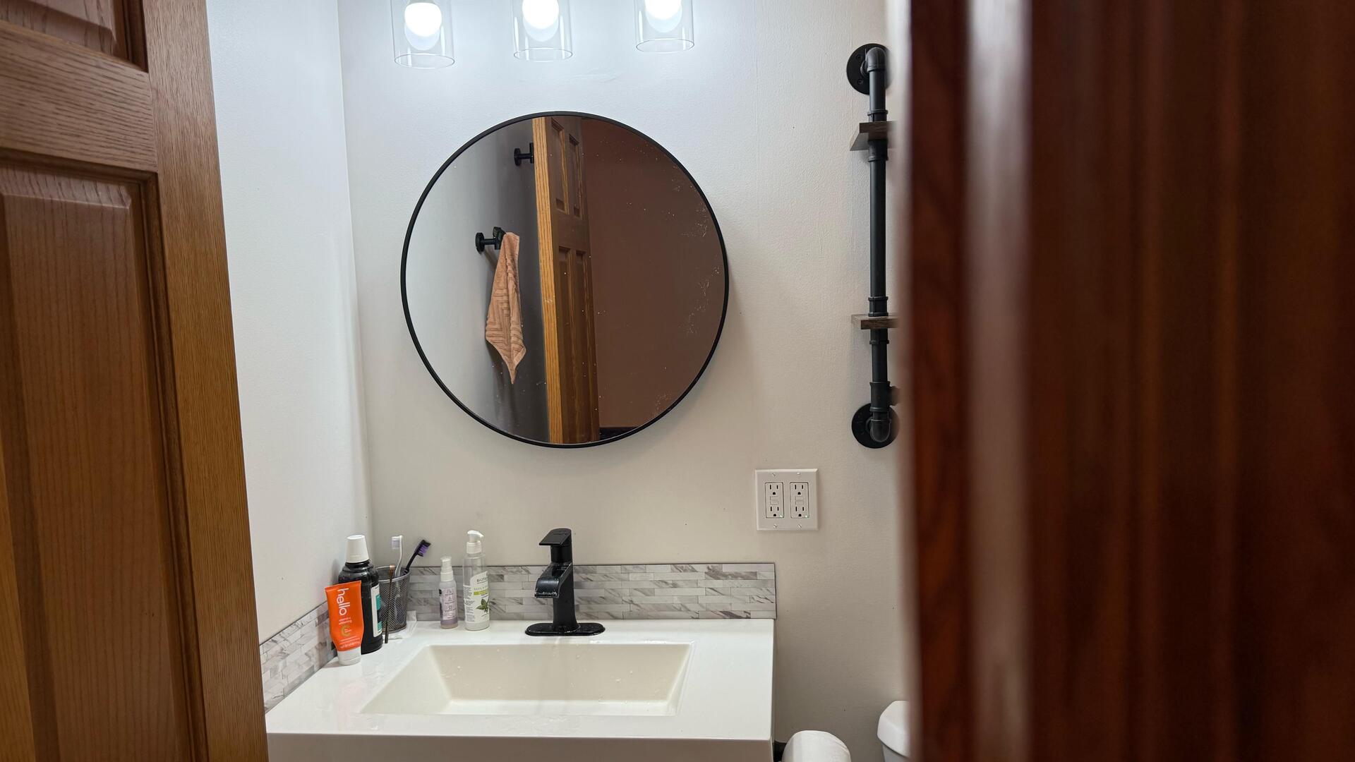 4 Memory Lane Streator, IL 61364 - Photo 19 of 28 a bathroom with a sink and a mirror