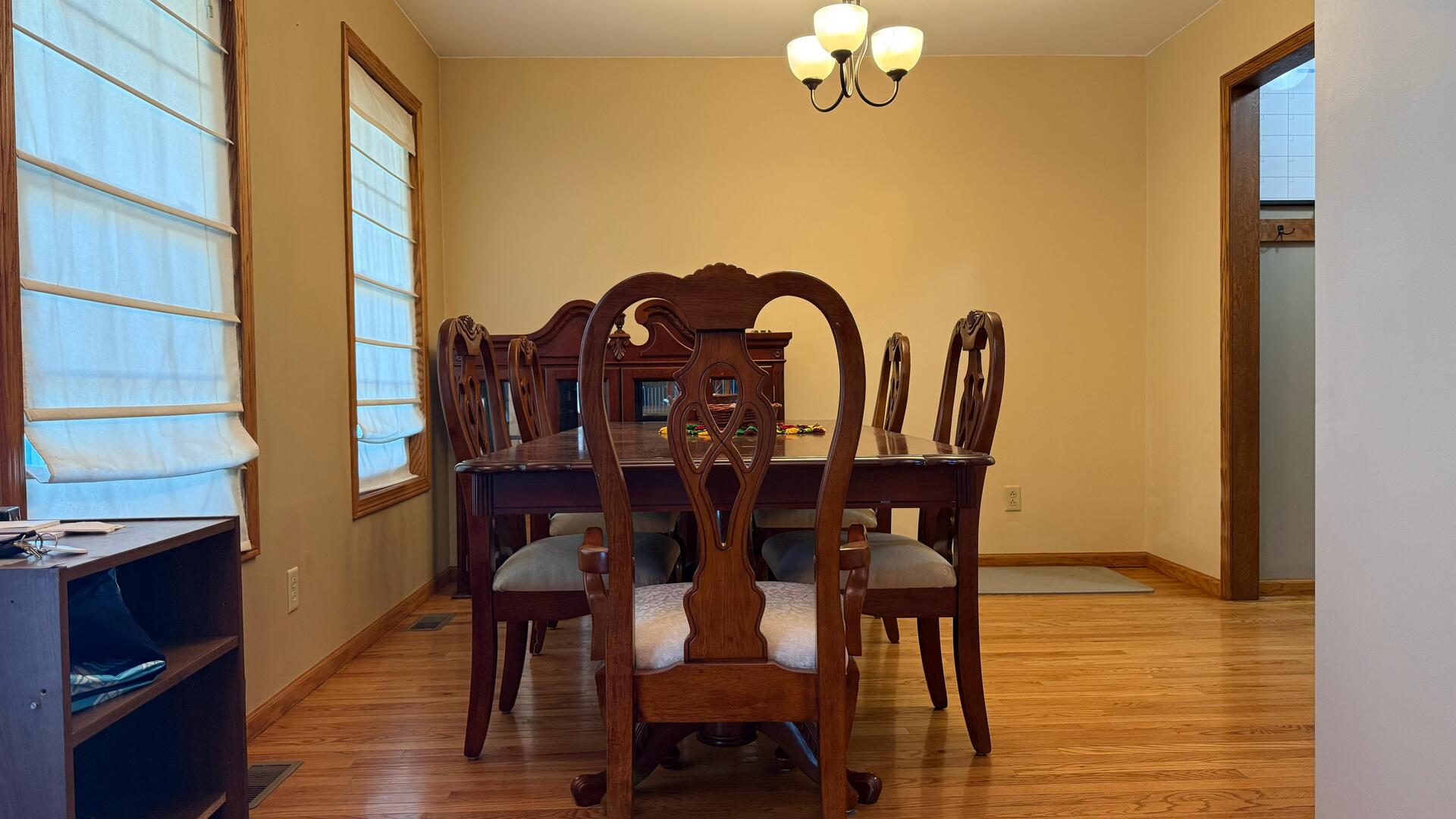 4 Memory Lane Streator, IL 61364 - Photo 4 of 28 a view of a dining room with furniture and wooden floor