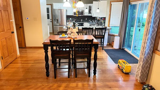 a view of a dining room with furniture