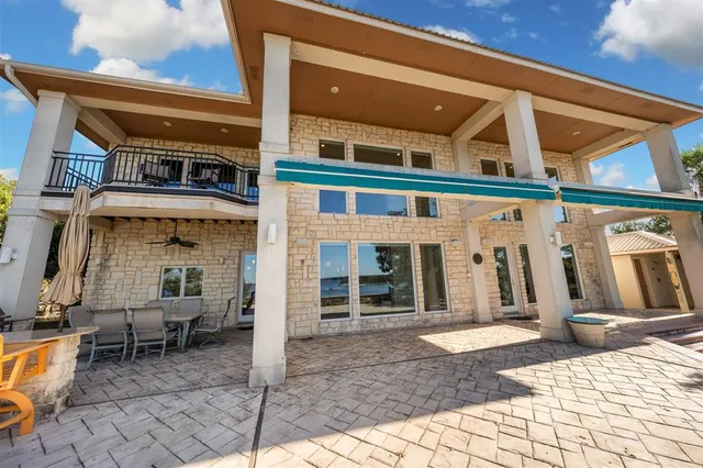 a view of a building with sitting area