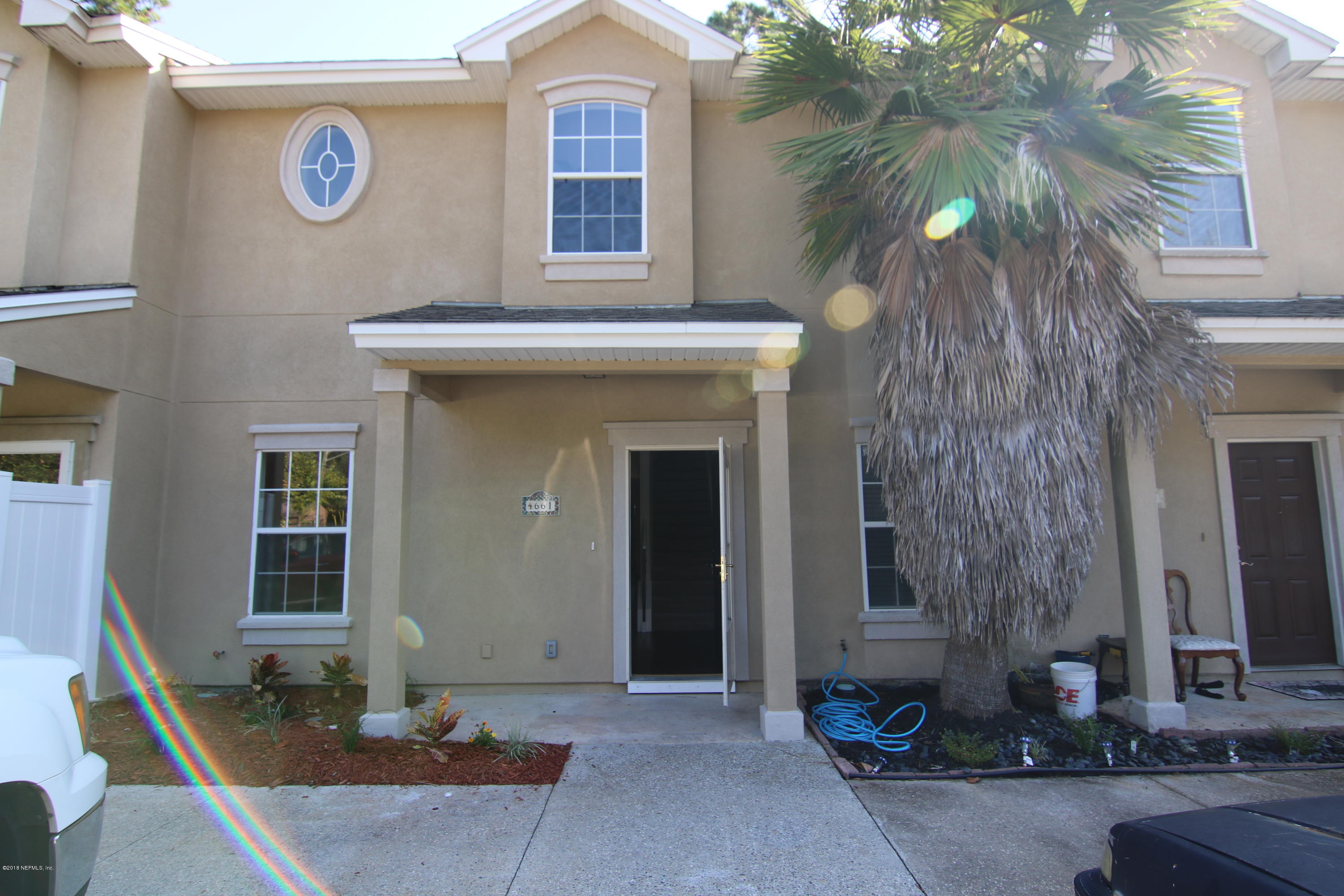 4661 Barnes Road South Jacksonville, FL 32207 - Photo 22 of 22 a front view of a house with parking