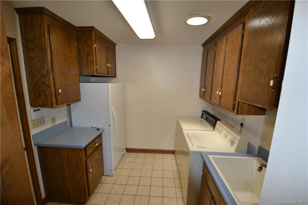 8147 Fairfield Forest Road Denver, NC 28037 - Photo 11 of 23 a bathroom with a sink and a mirror