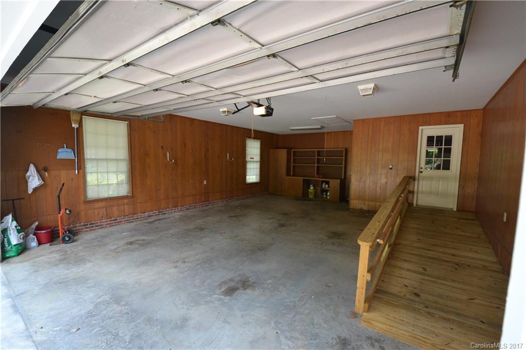 8147 Fairfield Forest Road Denver, NC 28037 - Photo 4 of 23 a view of a room with wooden floor and stairs