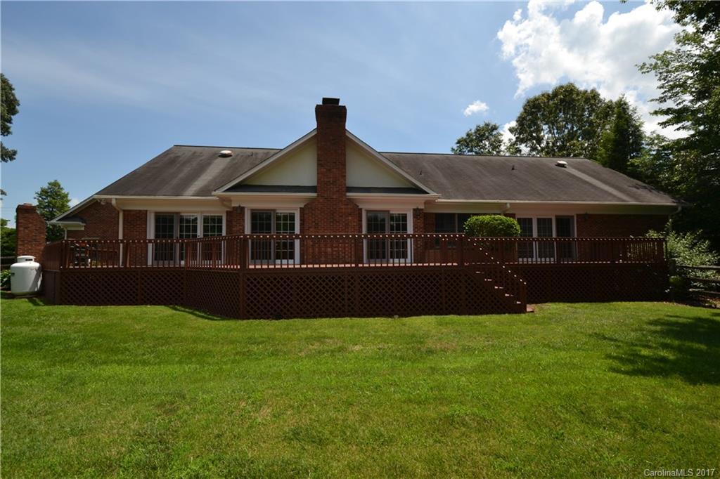 8147 Fairfield Forest Road Denver, NC 28037 - Photo 5 of 23 a view of house with a garden