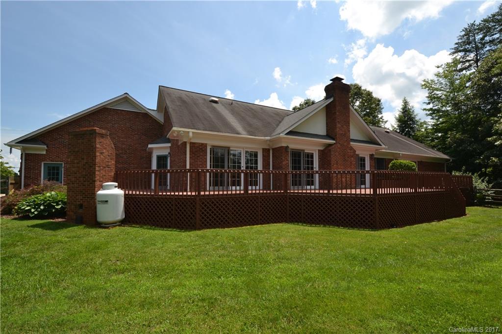 8147 Fairfield Forest Road Denver, NC 28037 - Photo 6 of 23 a front view of a house with garden
