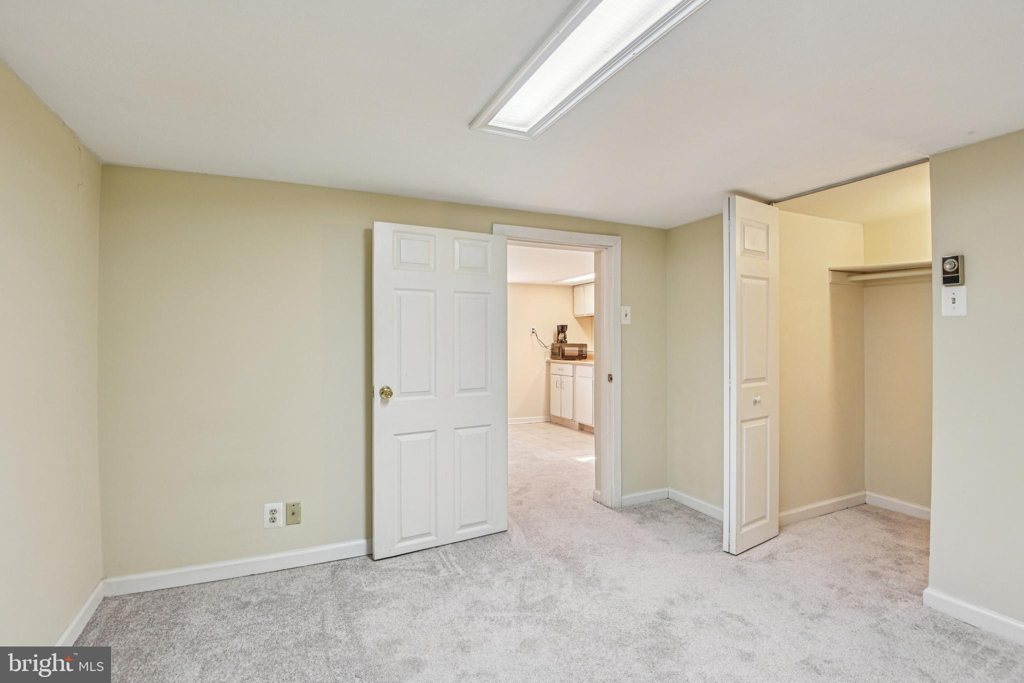 209 Locust Street, Unit B Frederick, MD 21703 - Photo 12 of 14 an empty room with closet