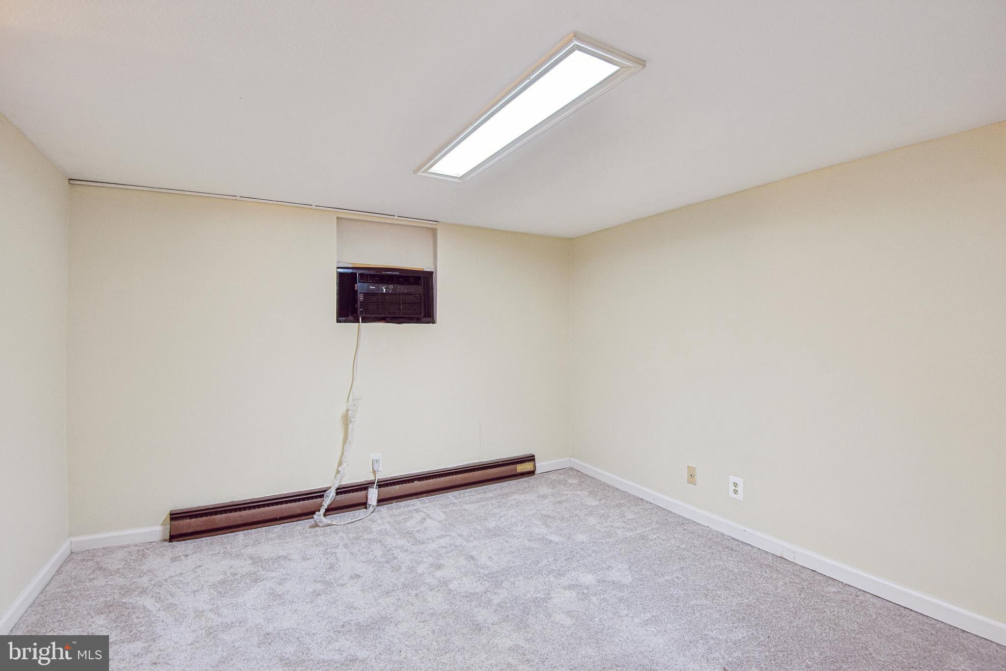 209 Locust Street, Unit B Frederick, MD 21703 - Photo 10 of 14 a view of an empty room