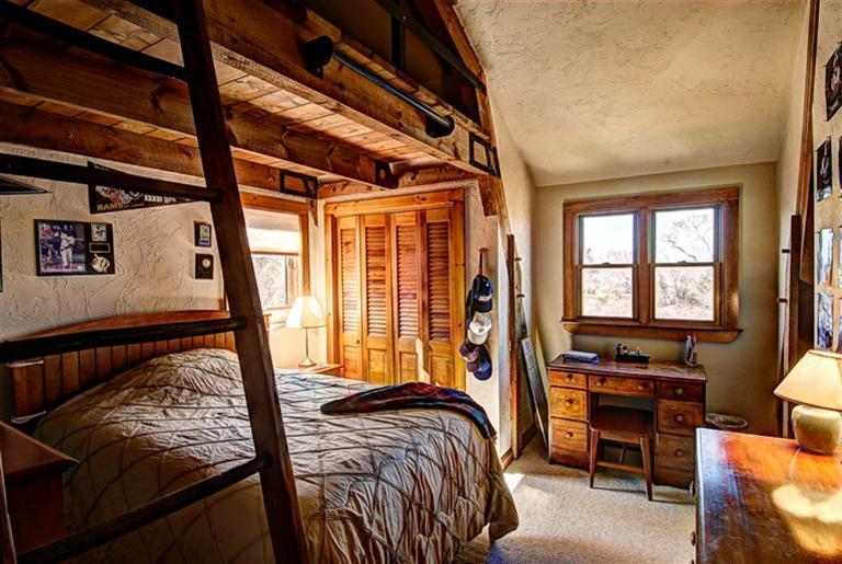 36 Torrey Road East Sandwich, MA 02537 - Photo 11 of 24 a bed sitting in a bedroom next to a window