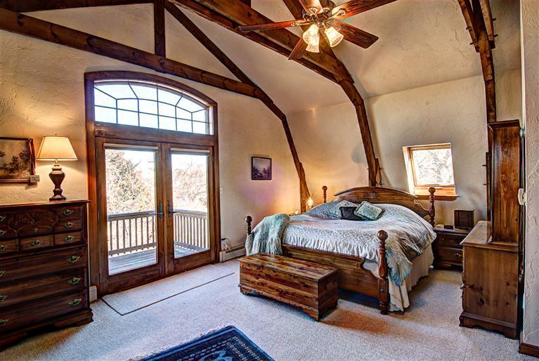 36 Torrey Road East Sandwich, MA 02537 - Photo 13 of 24 a bedroom with a bed a dresser next to a window