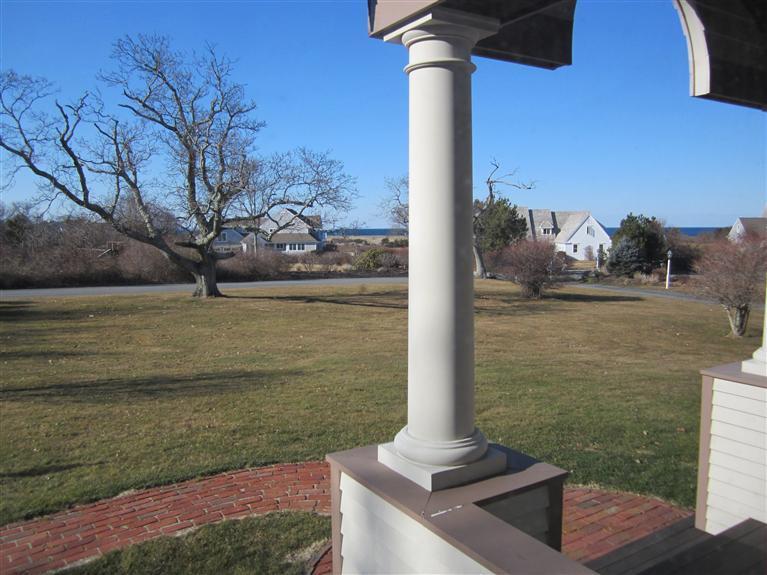 36 Torrey Road East Sandwich, MA 02537 - Photo 20 of 24 a view of a lake with a floor to ceiling windows