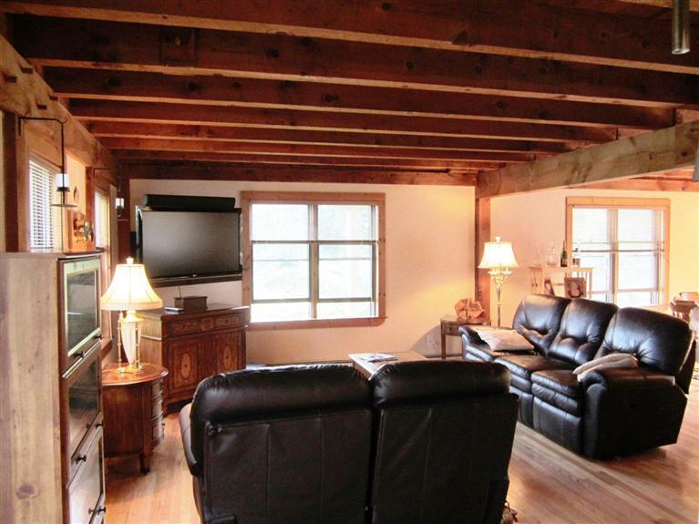 36 Torrey Road East Sandwich, MA 02537 - Photo 4 of 24 a living room with furniture and a flat screen tv