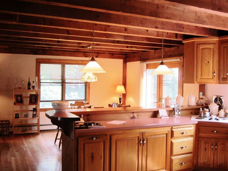 36 Torrey Road East Sandwich, MA 02537 - Photo 5 of 24 a kitchen with a sink a window and chairs