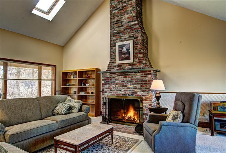 36 Torrey Road East Sandwich, MA 02537 - Photo 8 of 24 a living room with furniture and a fireplace