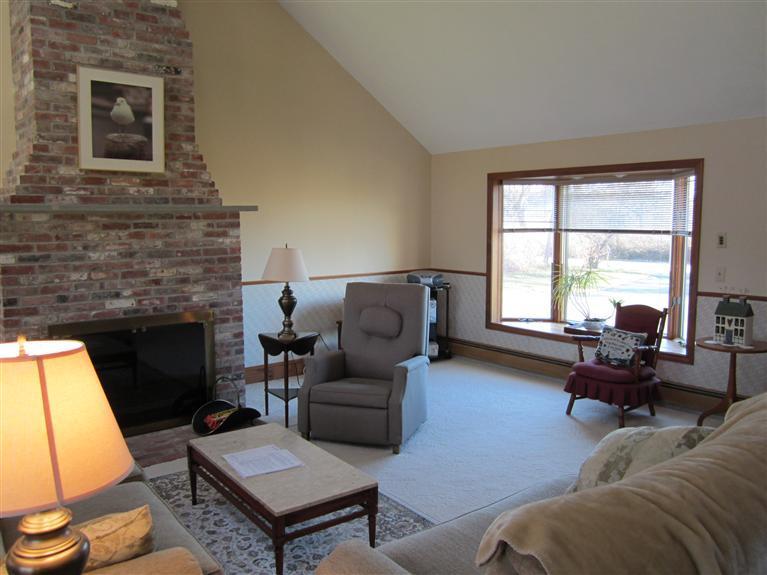 36 Torrey Road East Sandwich, MA 02537 - Photo 9 of 24 a living room with furniture and a fireplace