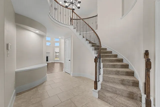 a view of staircase with white walls and white walls