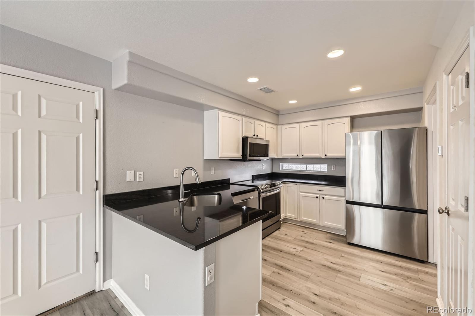 11745 Zenobia Loop Westminster, CO 80031 - Photo 13 of 28