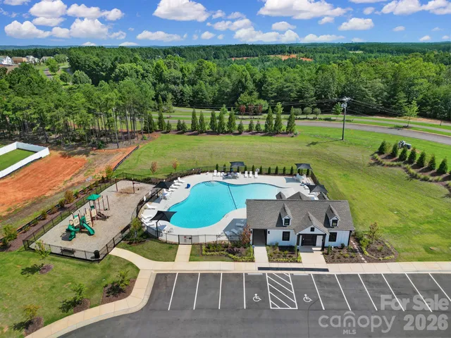 a view of a house with a big yard
