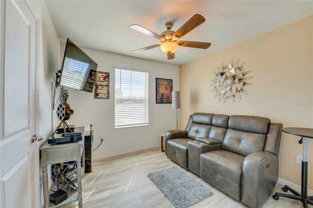 3986 Willowbrook Drive Edgewater, FL 32141 - Photo 33 of 57 a living room with furniture and a window