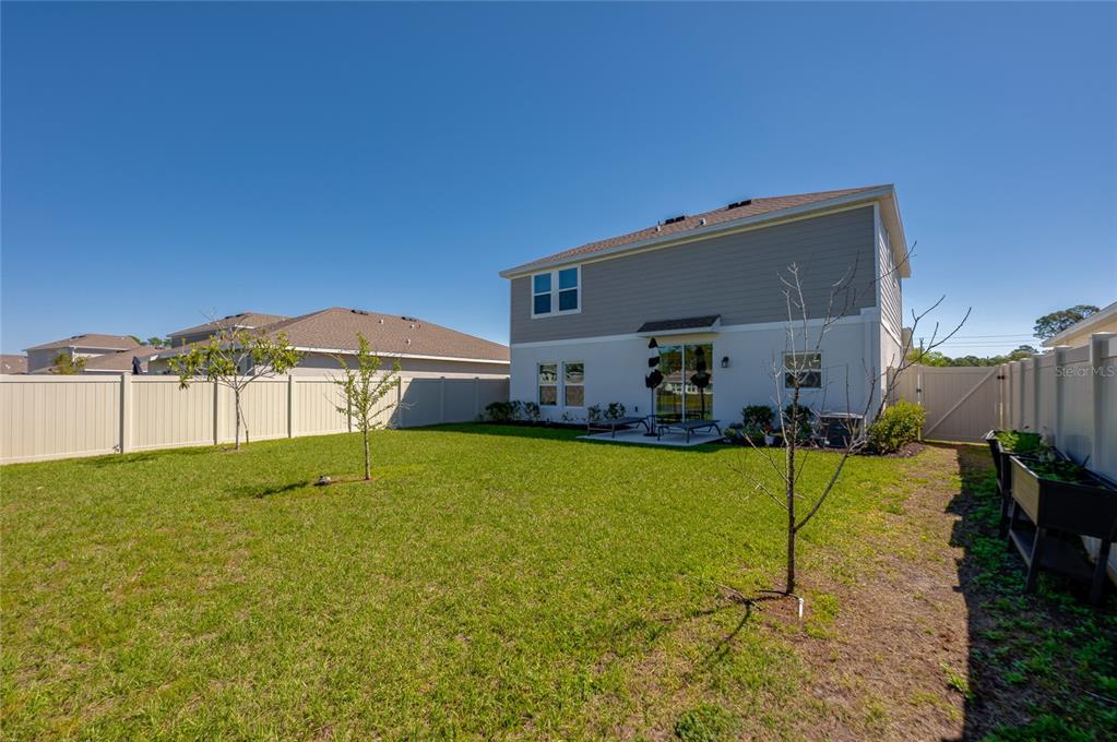 3986 Willowbrook Drive Edgewater, FL 32141 - Photo 40 of 57 a house view with a outdoor space