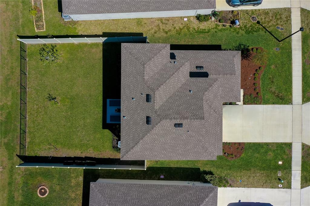 3986 Willowbrook Drive Edgewater, FL 32141 - Photo 5 of 57 an aerial view of a house with a yard