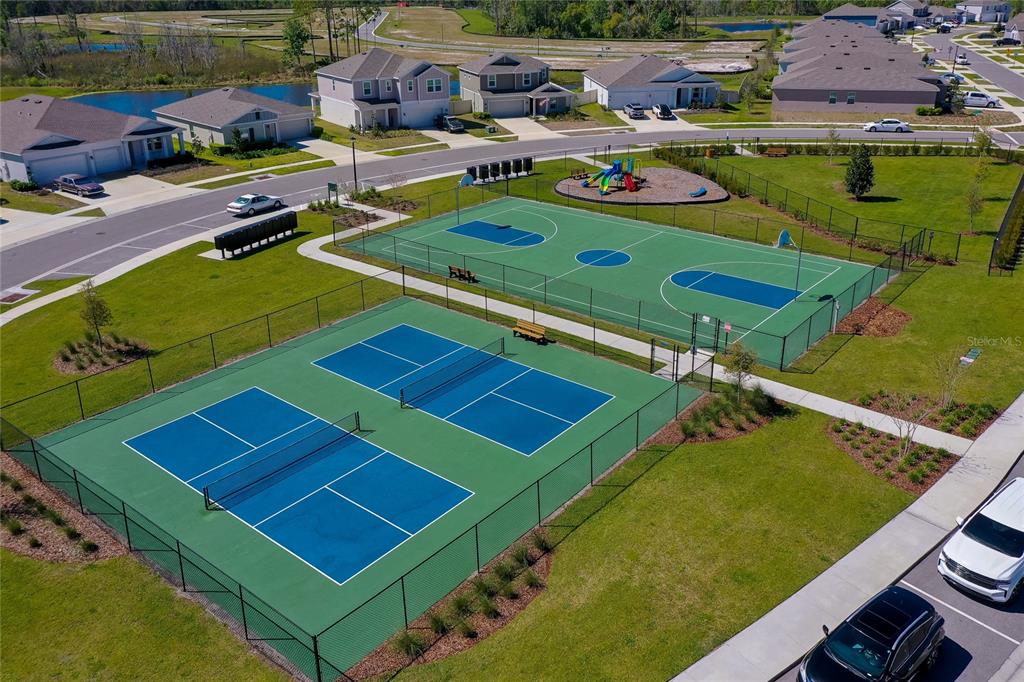 3986 Willowbrook Drive Edgewater, FL 32141 - Photo 51 of 57 an aerial view of a pool yard and outdoor seating
