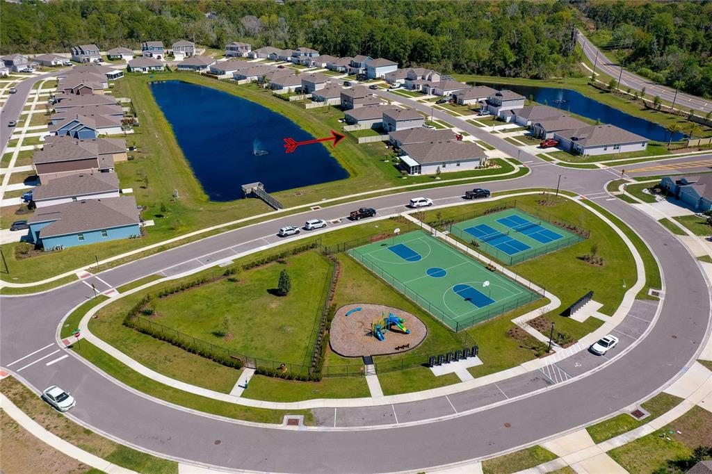 3986 Willowbrook Drive Edgewater, FL 32141 - Photo 55 of 57 a view of a swimming pool with a chairs and table in the terrace