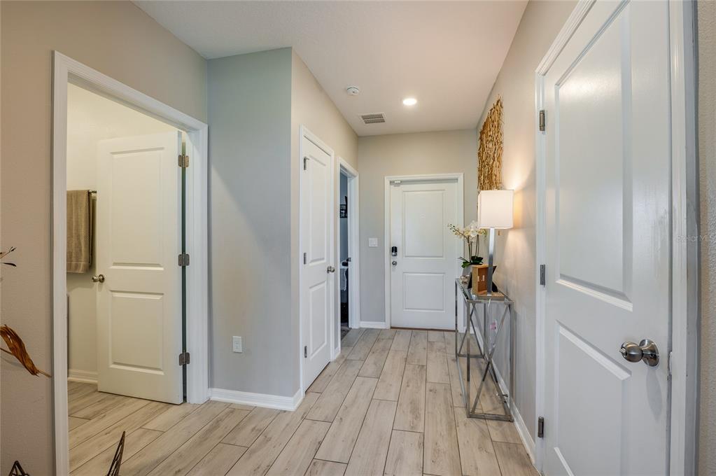 3986 Willowbrook Drive Edgewater, FL 32141 - Photo 7 of 57 a view of hallway with wooden floor