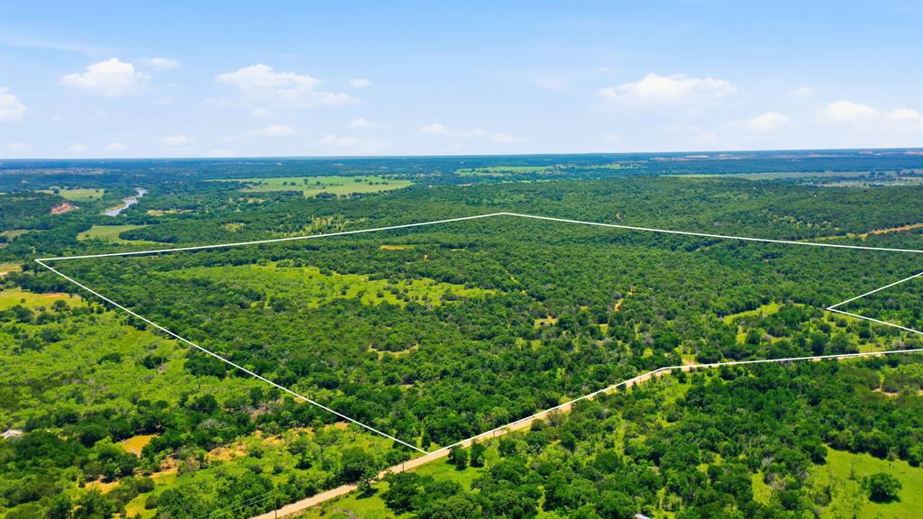 4320 Dobbs Valley Road Millsap, TX 76066 - Photo 1 of 40 a view of a green field with lots of green space