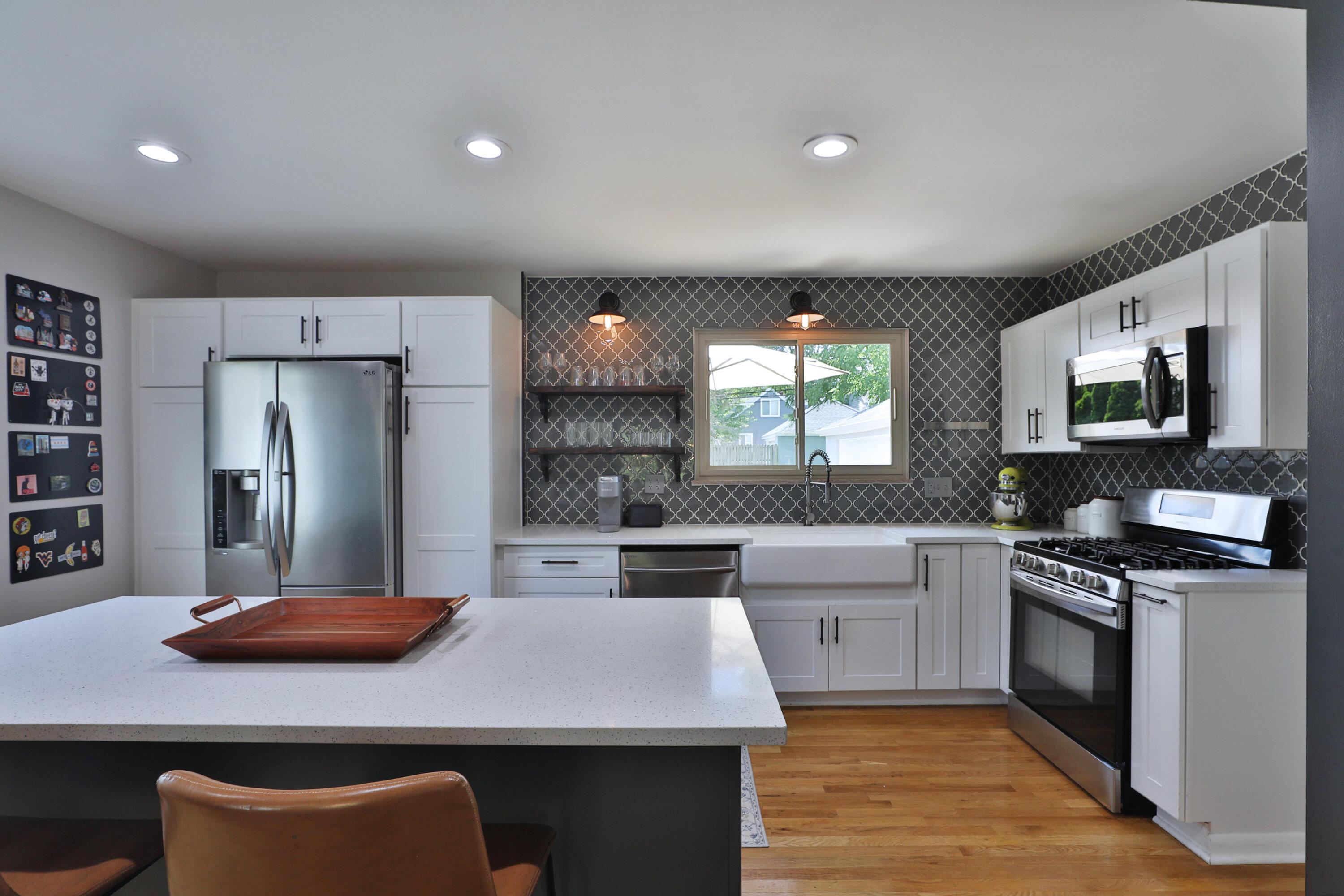315 South Kellner Road Columbus, OH 43209 - Photo 15 of 51 Quartz countertops with flecks of sparkle, recessed lighting.