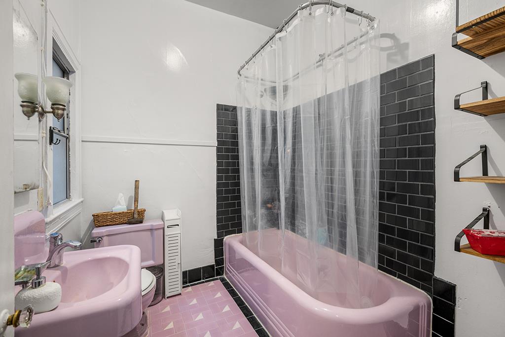 2874-2882 Telegraph Avenue Oakland, CA 94609 - Photo 14 of 18 a bathroom with a sink toilet and shower