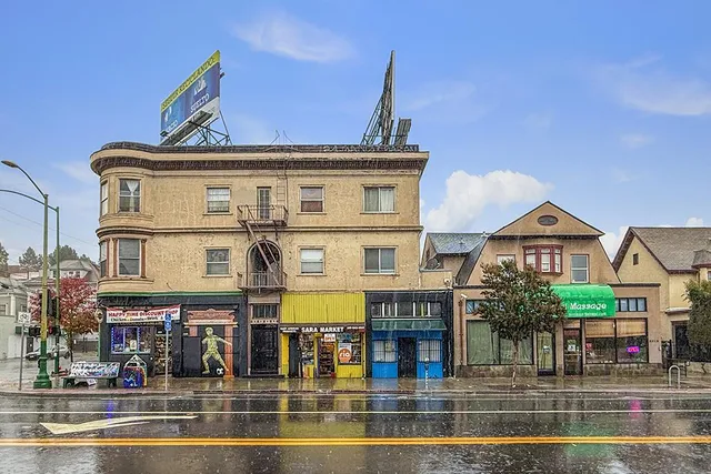 a view of a big building with floor to ceiling windows and a building
