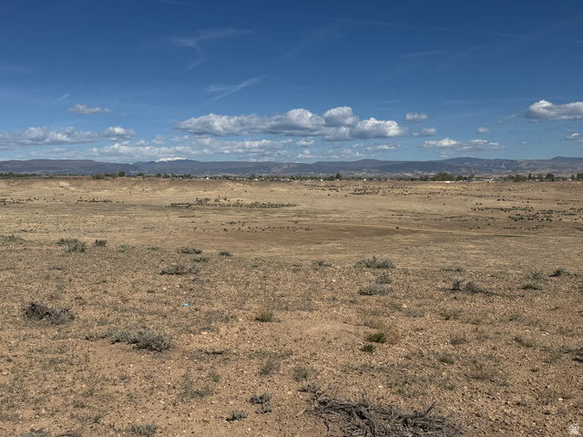 3100 East 5600 Goose Ranch Road South Vernal, UT 84078 - Photo 9 of 16 View of undeveloped land featuring mountains and rural landscape