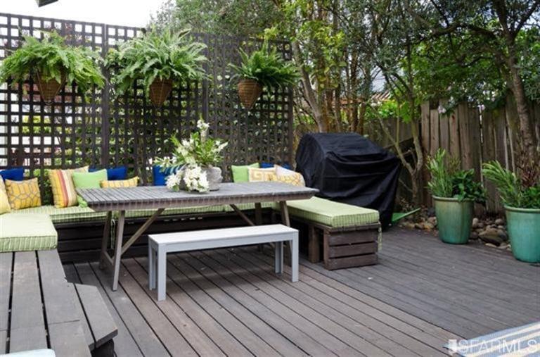 76 Rossi San Francisco, CA 94118 - Photo 11 of 30 A second view of the rear decked yard showing built-in seating, perfect for outdoor relaxing or dining.