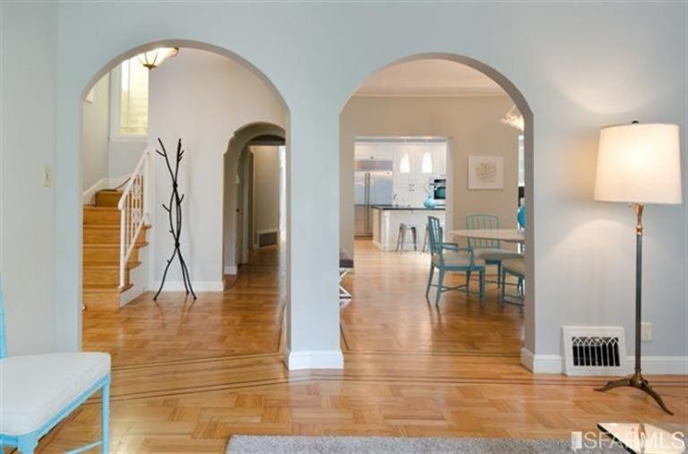 76 Rossi San Francisco, CA 94118 - Photo 14 of 30 View from the living room of the foyer, hall, dining room and kitchen seen through a set of arched doorways.