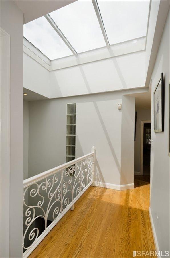 76 Rossi San Francisco, CA 94118 - Photo 25 of 30 Upper hallway connecting front and rear bedrooms showing the retractable atrium skylight, which can be seen from the kitchen below.